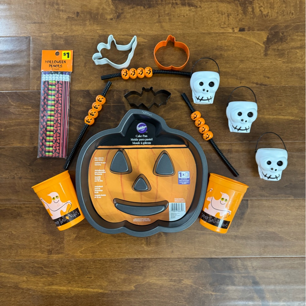Wilton Jack-o’-lantern cake pan, Halloween themed cookie cutters, straws, etc